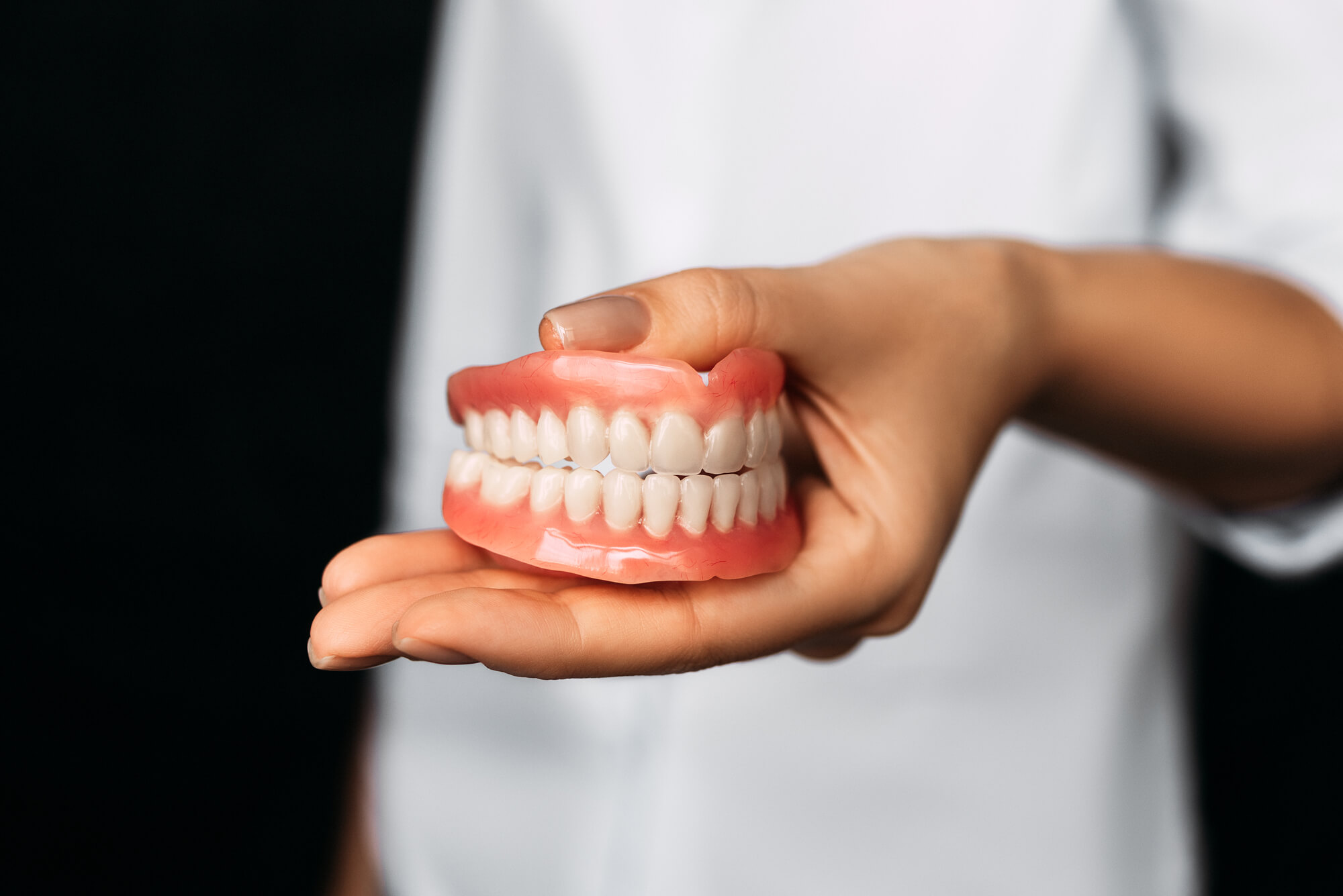 Should I Take My Dentures Off at Night? Village Square Dental