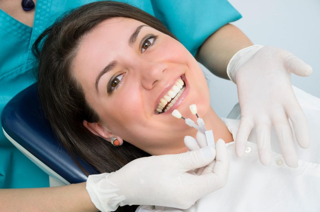 woman smiling and is about to get Dental Implants in 33026