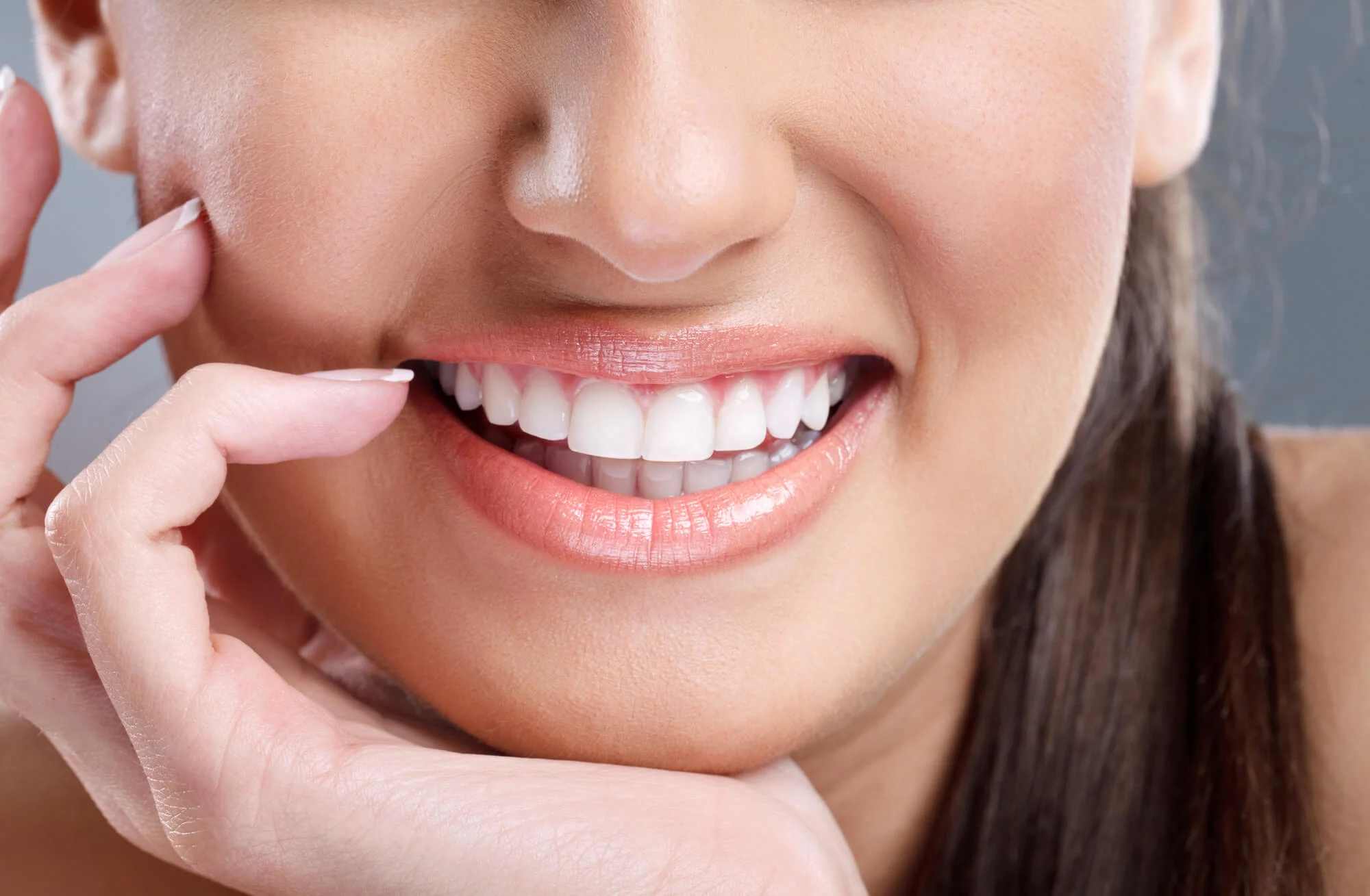 girl smilling after teeth whitening