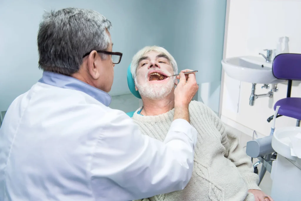 Elderly patient visiting dentists who take Medicare in Pembroke Pines for dental care.
