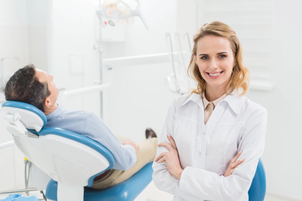 Patient enjoying friendly care from a dentist on Hiatus Rd